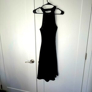 Little black dress from Jones New York size 4 with sequins and stone work